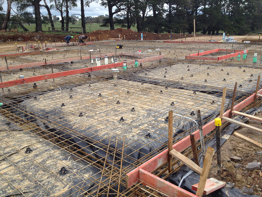 Reinforcement bars and framework for a house foundation