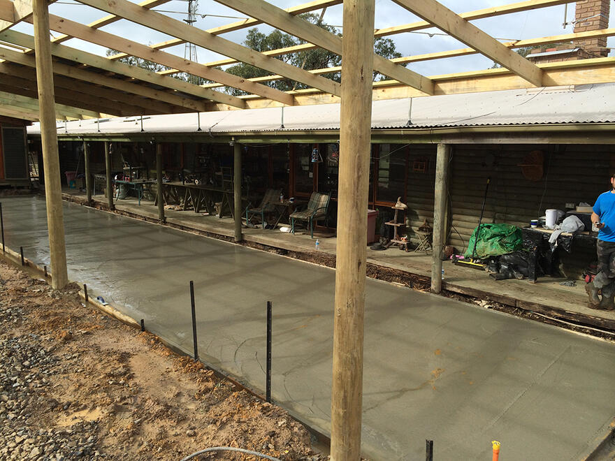 Wide concrete slab foundation poured for a new residence