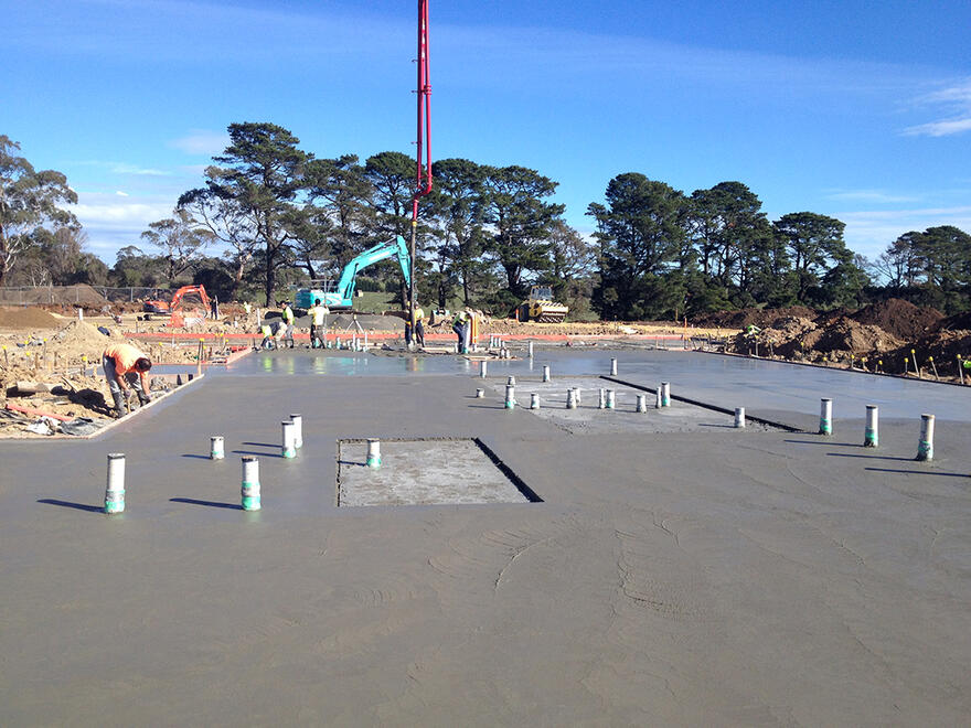 Large site with concrete slab foundations for new homes